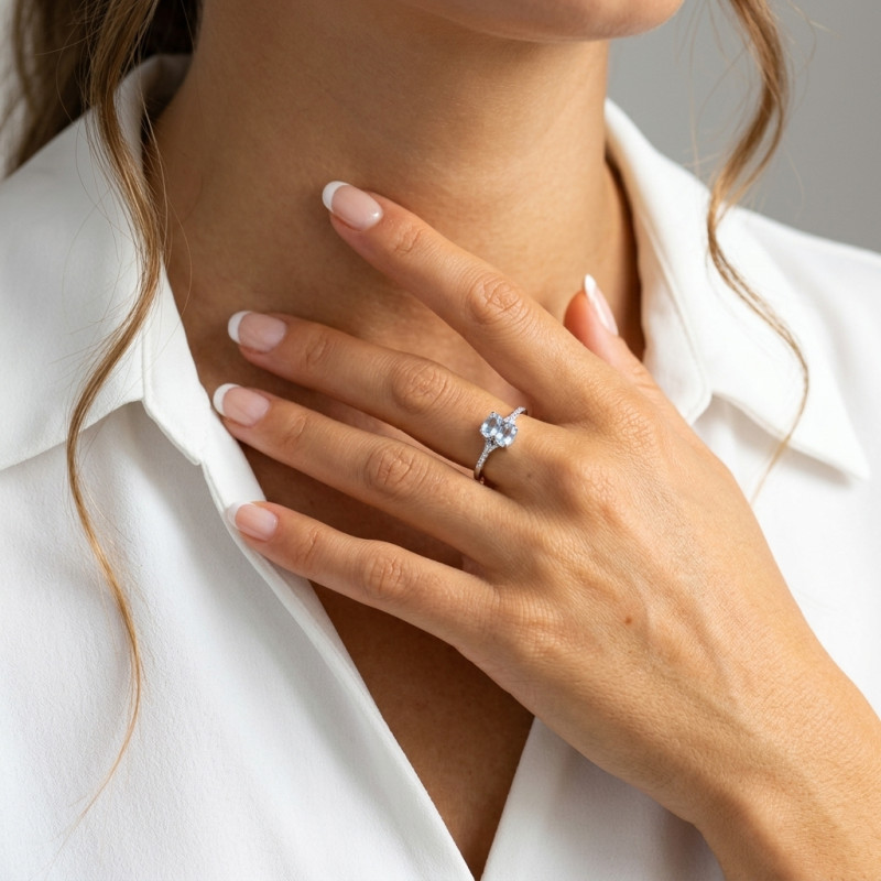 Bague Argent Rhodié 2 Topazes bleues traitées ovales de 6x4mm porté