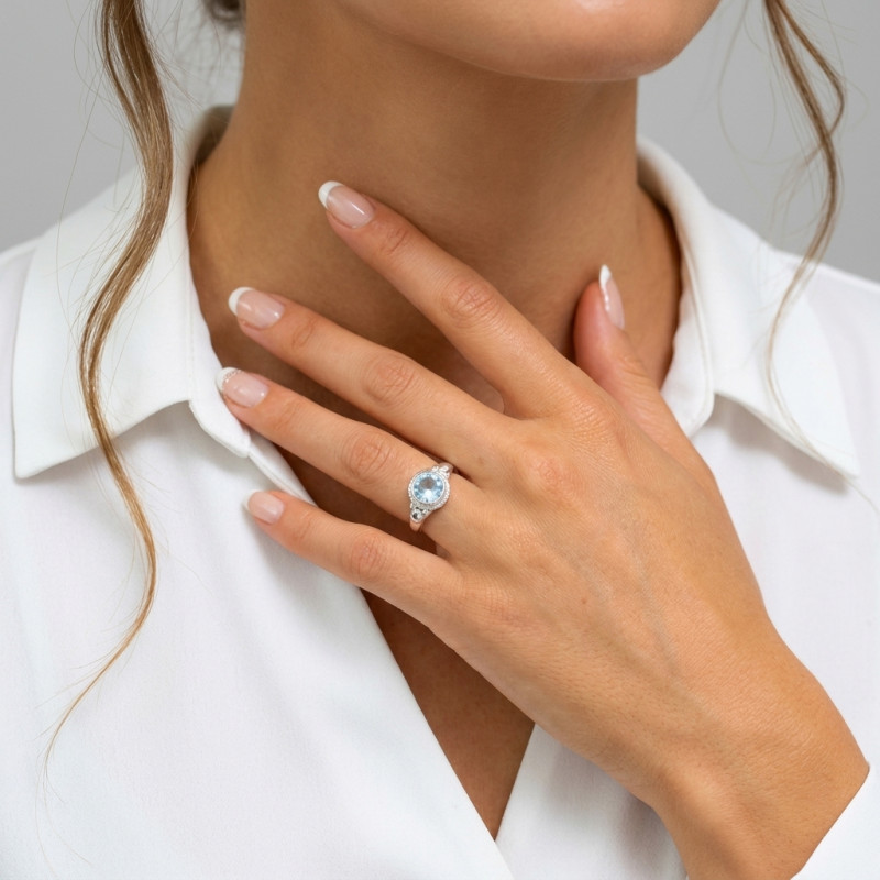 Bague Topaze bleue traitée en Argent 925 - Pierre Ronde 8mm porté