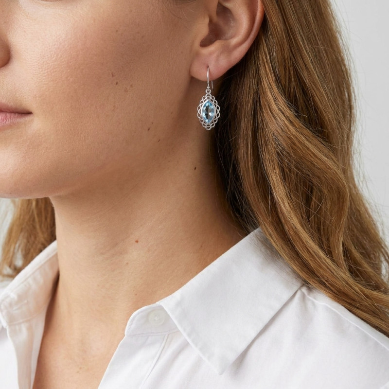 Boucles d'oreilles Argent Topaze Bleue traitée Navette 12x6mm porté