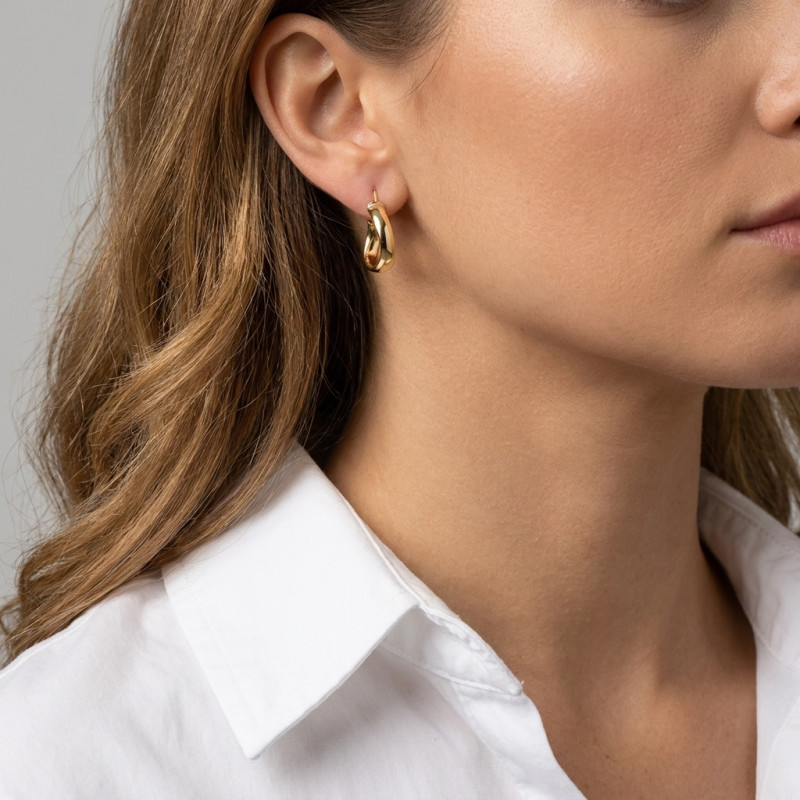 Boucles d'oreilles Créoles Ondulées Or Jaune 750 porté