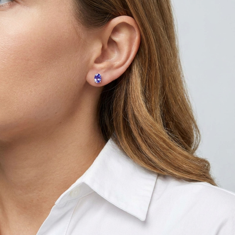 Boucles d'oreilles Or Blanc Tanzanites AAA Ovales 6x4mm porté