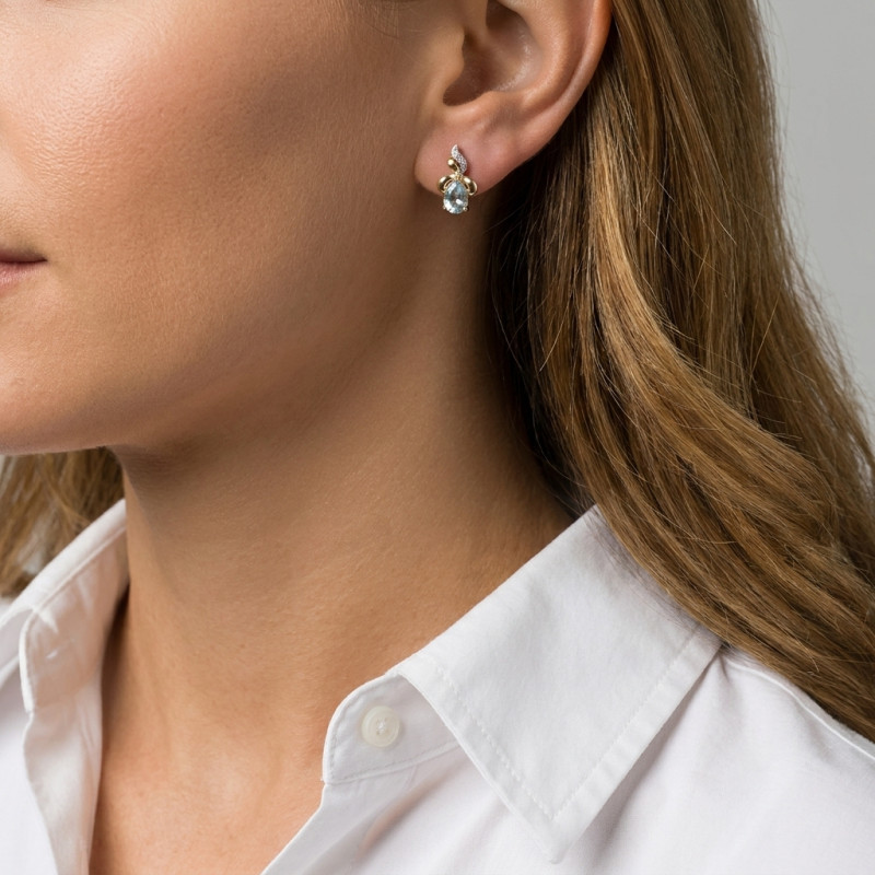 Boucles d'oreilles Or Jaune  375 Topaze bleue traitée Poire 6x4mm et Diamant porté