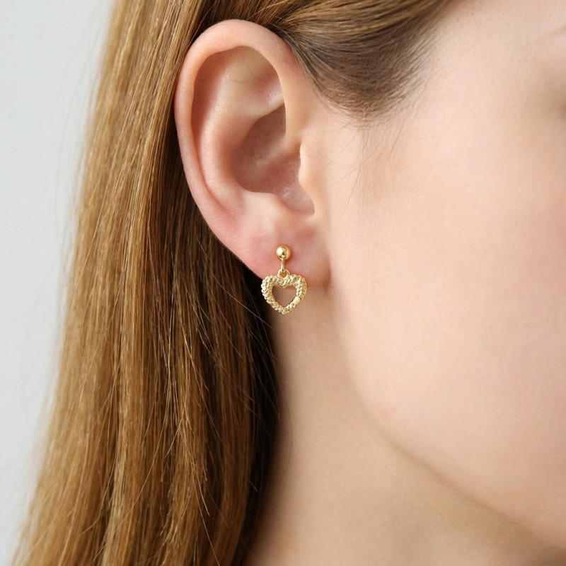 Boucles d'oreilles pendantes Argent 925 doré Coeur texturé porté