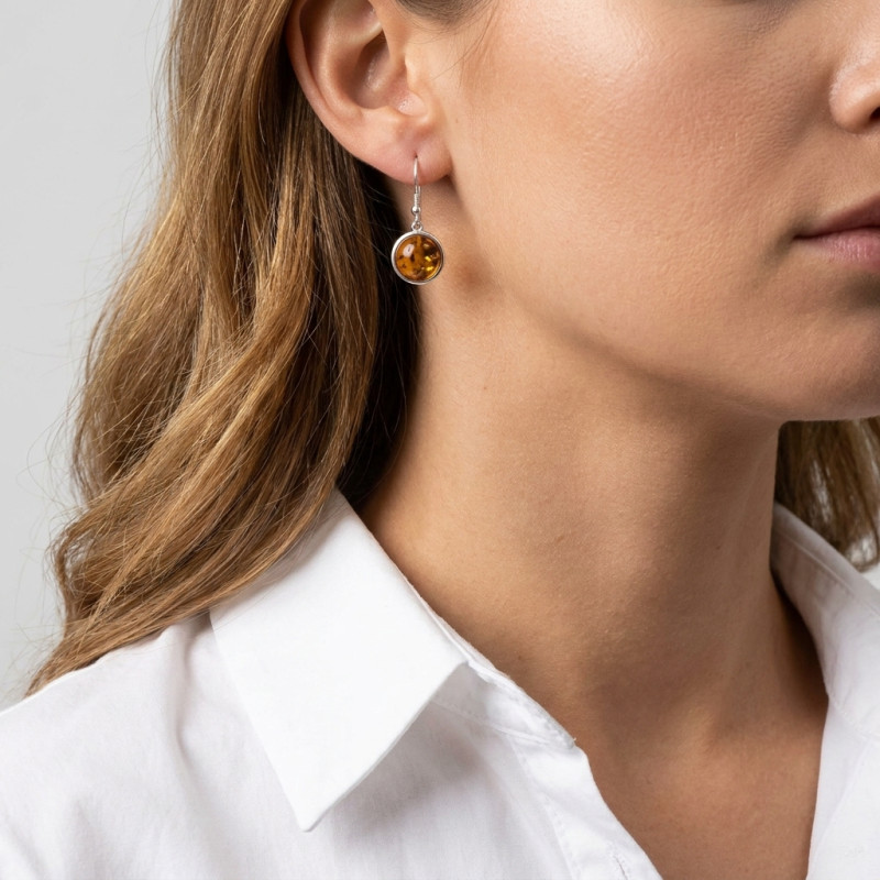 Boucles d'oreilles pendantes Argent et Ambre ronde porté