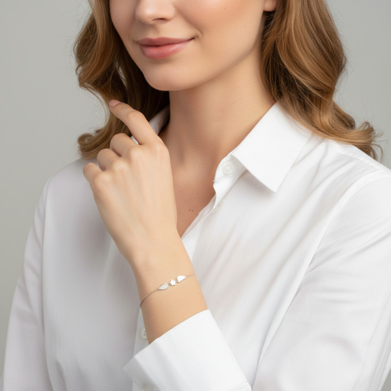 Bracelet Argent Rhodié Ailes d'ange et étoile porté