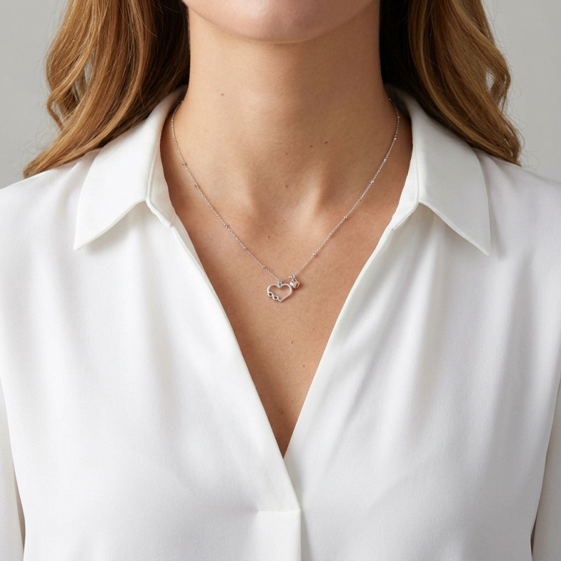 Collier argent rhodié coeur et infini porté