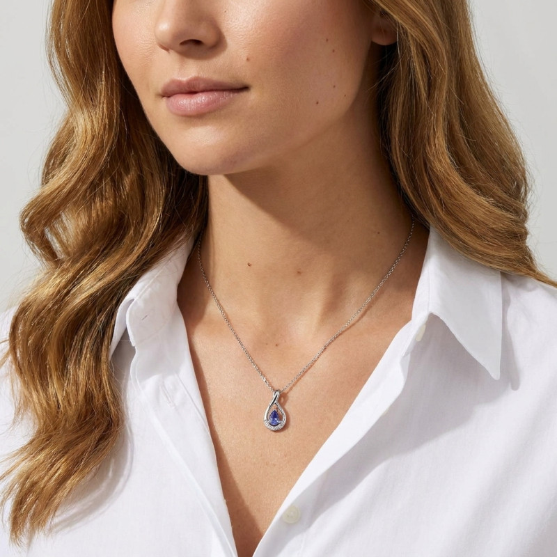 Pendentif Or blanc 375 Tanzanite Poire 5x3mm et Diamant porté