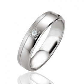 Alliance en argent 925 platiné et Diamant.. Alliance sertie d&#39;un diamant taille brillant de 0,02 carat.. Alliance comp...