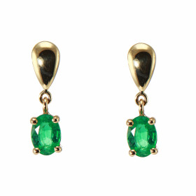  Boucles d oreilles pendantes Or Jaune serties d émeraudes qualité AAA Ces émeraudes ovales 7x5mm sont serties par 4 griff...