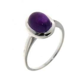 Bague de style classique sertie d'une pierre ovale. La pierre est taillée en cabochon , elle mesure 9x7mm. Monture solitai...