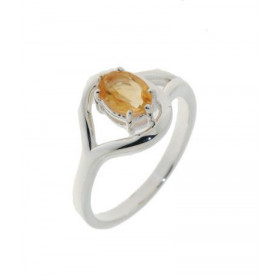 Bague Argent 925 sertie d'une citrine ovale de 7x5mm. Largeur de la monture (vue de dessus) : 12mm