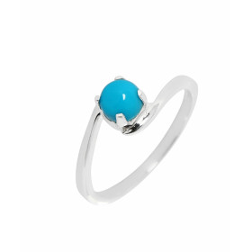 Bague Turquoise reconstituée en Argent. Jolie monture croisée sertie d'une pierre ronde de 5mm. Largeur de la monture (sur...