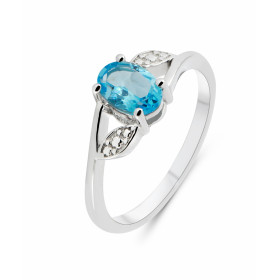 Bague Argent Rhodié Topaze Bleue Ovale 7x5mm Bague sertie d une pierre ovale 7x5mm Corps motifs perlés Pierre sertie à gri...