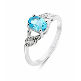 Bague Argent Rhodié Topaze Bleue Ovale 7x5mm Bague sertie d une pierre ovale 7x5mm Corps motifs perlés Pierre sertie à gri...