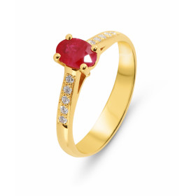 Bague en Or Jaune 750 sertie d&#39;un Rubis ovale de 6x4mm (0,55 carat) et de 10 diamants de 1,3mm de diamètre. Poids tota...