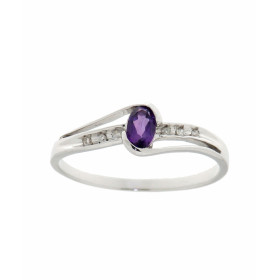 Bague Améthyste Diamant Or Blanc 375 La pierre centrale est une Améthyste ovale mesurant 5x3mm Elle est maintenue sur cett...