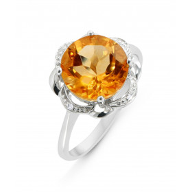 Bague Or Blanc 375 Citrine 10mm et Diamant. Citrine ronde de 10mm sertie à griffes. Poids Citrine : 3 carats. Entourrage c...