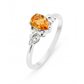 Bague Or Blanc 375 Citrine Poire 7x5mm et Diamants. Bague sertie d'une Citrine poire de 7x5mm et de 4 diamants. Poids Citr...