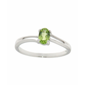 Bague Or Blanc 375 Péridot Cette jolie bague corps ondulé est ornée d une pierre ovale La pierre mesure 6x4mm, elle est ma...