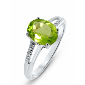 Bague Or blanc 375 Péridot Ovale 9x7mm Diamant Cette bague Or blanc 375 est ornée d un péridot ovale La pierre mesure 9x7m...
