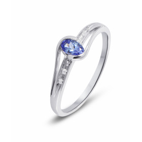 Bague Tanzanite et Diamant en Or Blanc 375. La pierre centrale est une Tanzanite ovale mesurant 5x3mm. Elle est maintenue ...