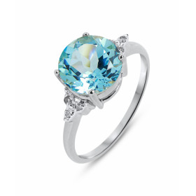 Bague Or blanc 375 Topaze Bleue Ronde 9mm et Diamant. Monture en Or 375 (Or 9 carats). Pierre centrale ronde de 9mm de dia...