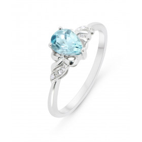 Bague Or Blanc 375 Topaze bleue traitée Poire 7x5mm Diamants Bague sertie d une Topaze bleue traitée poire 7x5mm 4 diamant...