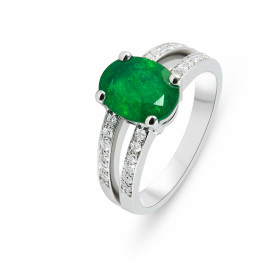  Bague Or Blanc 750 sertie d une émeraude ovale 9x7mm diamants Poids Emeraude : 1.45 carat Entourage composé 24 diamants p...