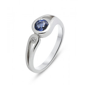  Bague Or Blanc 750 sertie d un Saphir Ceylan rond 5mm d un diamant rond 2,2mm Serti demi clos Poids Diamant : 0,045 carat...