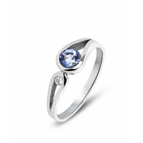 Bague en Or Blanc 750 sertie d&#39;un Saphir de Ceylan rond de 4mm et d&#39;un diamant rond de 2mm. Serti demi clos. Poids...