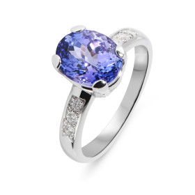  Bague Or Blanc 750 sertie d une tanzanite ovale 10x8mm (2.7 carats) 6 diamants 1,7mm diamètre pour un poids total 0,16 ca...