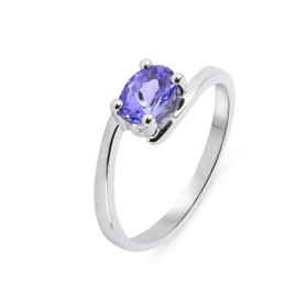 Bague Or Blanc 750 Tanzanite Ovale 7x5mm AAA. Pierre ovale de 7x5mm (0.8 carat) de qualité AAA. Serti demi clos. Monture c...