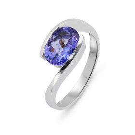  Bague Or Blanc 750 sertie d une Tanzanite AAA Ovale 9x7mm (1.8 carat) La Tanzanite est maintenue par un serti demi clos L...