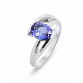 Bague en Or Blanc 750 sertie d&#39;une Tanzanite ovale de 9x7mm (2 carats). Sertissage Demi clos