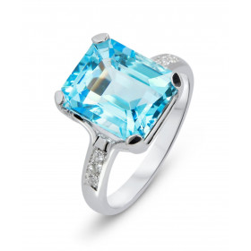  Bague Or Blanc 750 Topaze Bleue RPC 12x10mm Diamant Pierre rectangulaire 12x10mm (7.6 carats) Entourage composé 6 diamant...