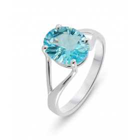  Bague Or Blanc 750 Topaze Bleue Traitée Ovale 10x8mm Dimensions pierre : 10x8mm Serti à griffes Poids Topaze Bleue : 3 ca...