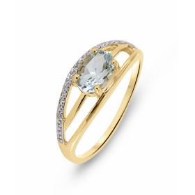  Bague Or jaune 375 sertie d une aigue marine ovale 7x5mm 5 diamants Largeur bague (sur doigt, vue dessus) : 7,1mm Poids D...