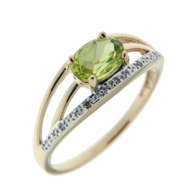 Bague Or jaune 375 sertie d un péridot ovale 7x5mm 5 diamants Largeur bague (sur doigt, vue dessus) : 7,1mm Poids Diamant ...