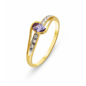 Bague Tanzanite et Diamant en Or Jaune 375. La pierre centrale est une Tanzanite ovale mesurant 5x3mm. Elle est maintenue ...