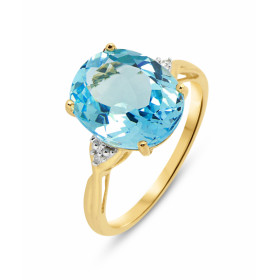 Bague Or jaune 375 Topaze Bleue Ovale 12x10mm et Diamant. Monture en Or 375 (Or 9 carats). Pierre centrale ovale de 12x10m...