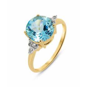 Bague Or jaune 375 Topaze Bleue Ronde 9mm et Diamant. Monture en Or 375 (Or 9 carats). Pierre centrale ronde de 9mm de dia...