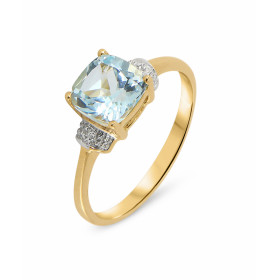 Bague Topaze Bleue Traitée Diamant Or 375 2 tons La pierre centrale est une Topaze Bleue taille coussin 7x7mm Elle est mai...