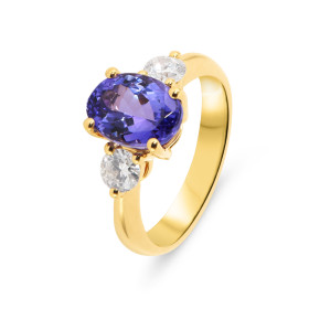 Bague Or Jaune 750 Tanzanite Ovale 10x7.5mm et Diamant. Bague en Or Jaune 750 (or 18 carats). Monture type solitaire accom...