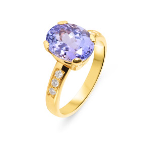 Bague en Or Jaune 750 sertie d&#39;une tanzanite ovale de 10x8mm (3.75 carats) et de 6 diamants de 1,7mm de diamètre pour ...