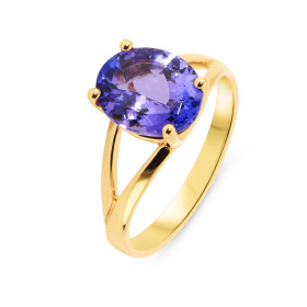 Bague en Or Jaune 750 sertie d&#39;une Tanzanite ovale de 11x9mm. Poids Tanzanite : 4.1 carats. Serti à griffes