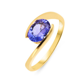  Bague Or Jaune 750 sertie d une Tanzanite Ovale 9x7mm Serti Demi Clos Monture Corps Croisé Poids Tanzanite : 1.65 carat Q...
