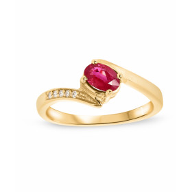 Bague en or jaune sertie d&#39;un rubis ovale de 6x4mm (0,6 carat) et de 5 diamants pour un poids total de 0,055 carat. Qu...