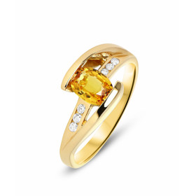  Bague or jaune sertie d un saphir orange traité ovale 7x5mm 6 diamants Poids Diamant : 0,07 carat Poids Saphir : 0.85 carat 