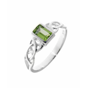 Bague au style celtique sertie d une petite pierre rectangulaire La pierre est taillée à facettes, elle mesure 6x4mm Elle ...