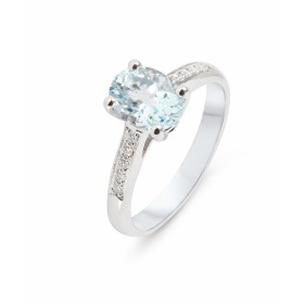 Bague Solitaire Aigue Marine et Diamant en Or Blanc 750. Cette bague est sertie d&#39;une aigue marine ovale de 8x6mm (1.2...